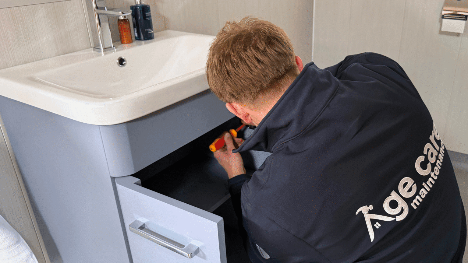 Age Care electrician working in a customer's home